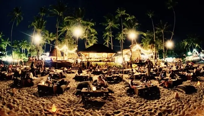 People chilling at Coco Tam's Beach Bar