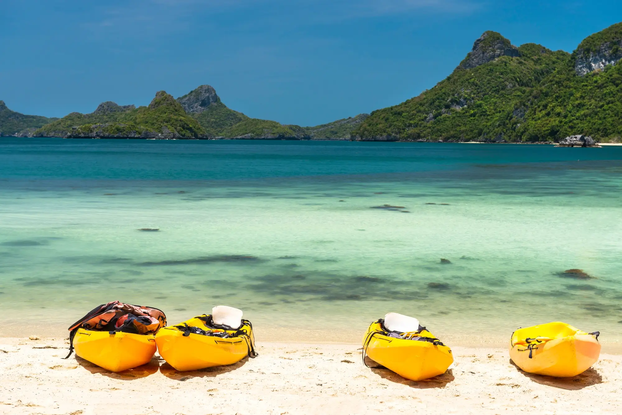 Kayaks lying on the beach at Mu Ko Ang Thong National Marine Park