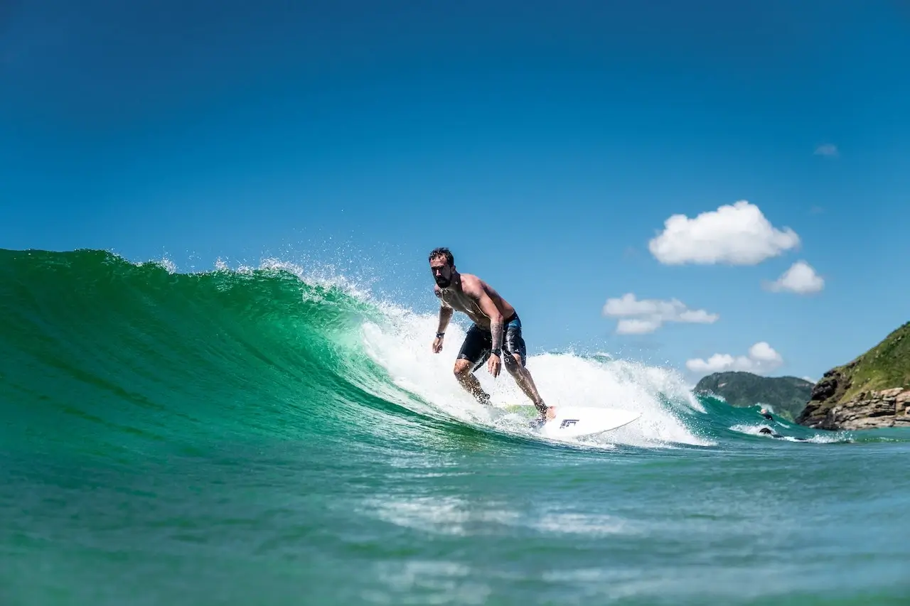 Guy surfing at Chaweng beach